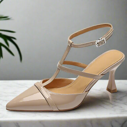 Beige patent leather kitten heel slingback shoes