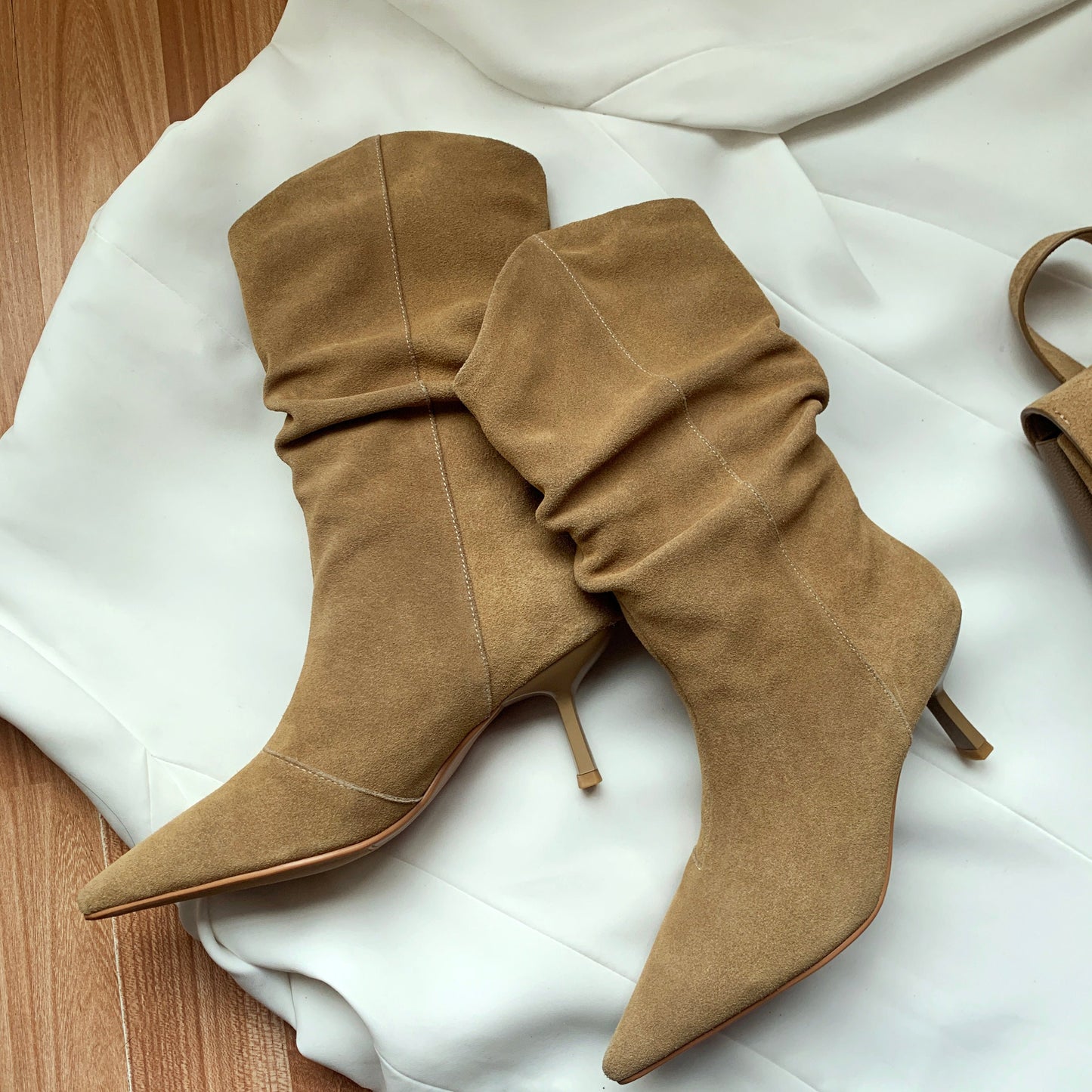 Beige suede pointed toe high heel boots