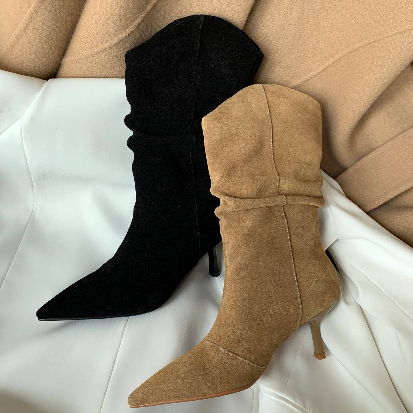 Black and beige suede boots