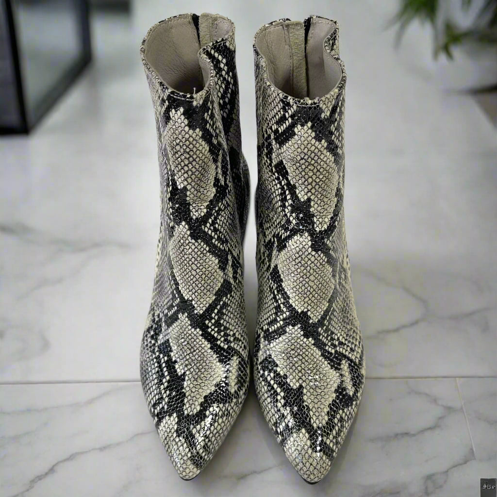 Pointed toe ankle boots in snake embossed leather  