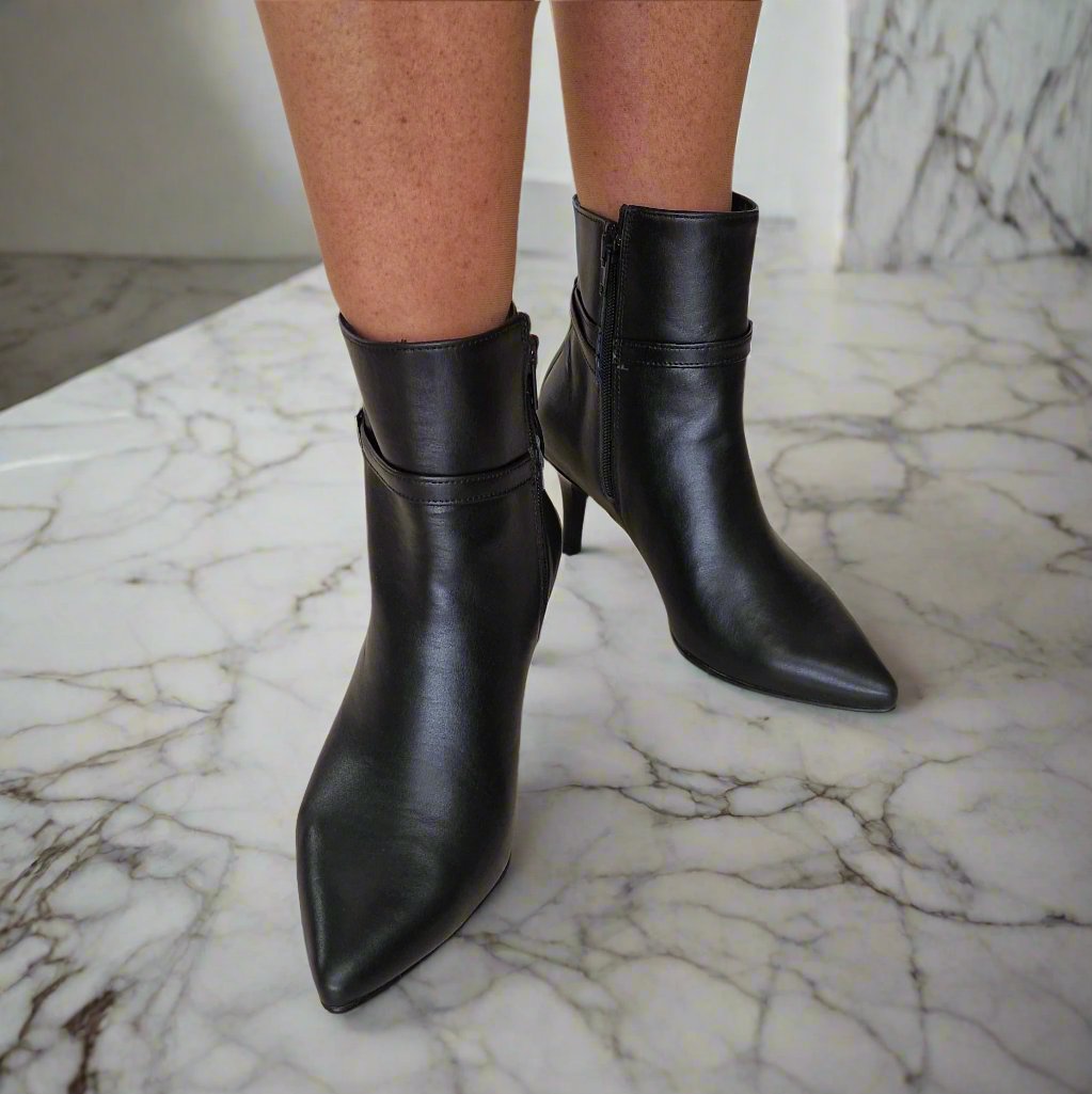 Black leather pointed toe ankle boots