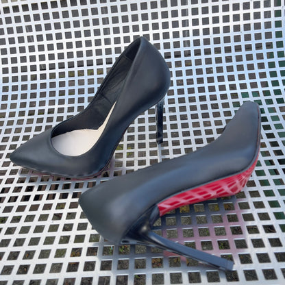 Red sole pointed toe high heels in black leather