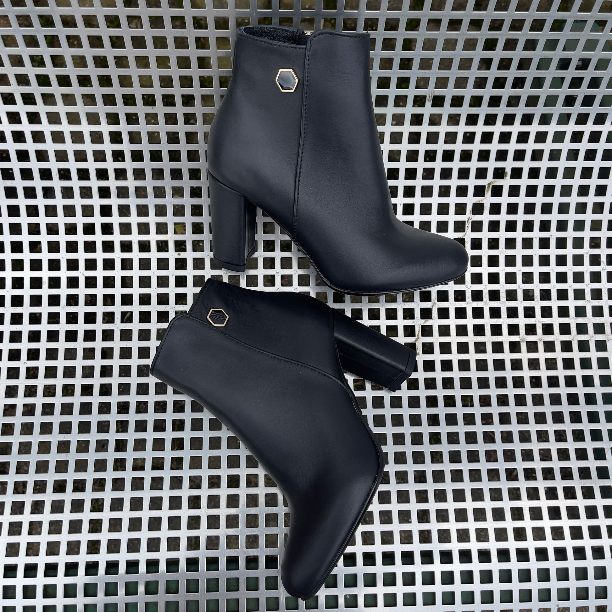 Petite size black leather ankle boots