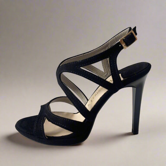 Black suede strappy heels with a red sole, shown from a side and top view on a white background.