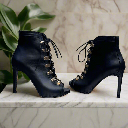 High heel gladiator style ankle boots with open toe in black leather