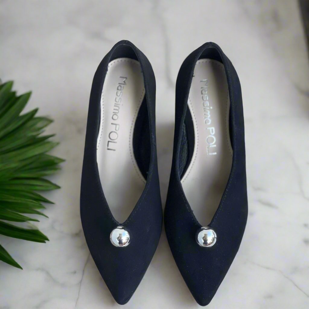 Pointed toe petite heels with a round silver brooch 