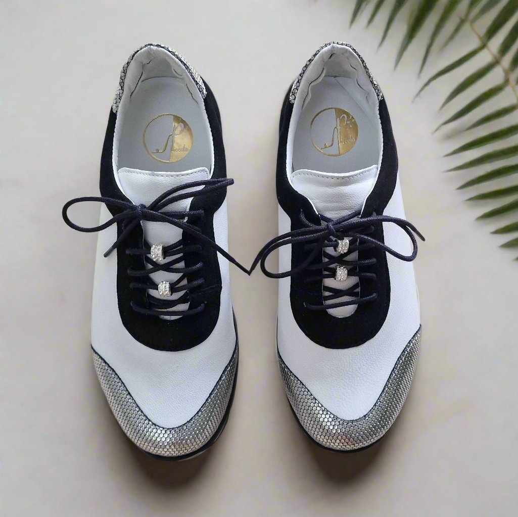 Petite women sneakers in white and black leather with silver accents