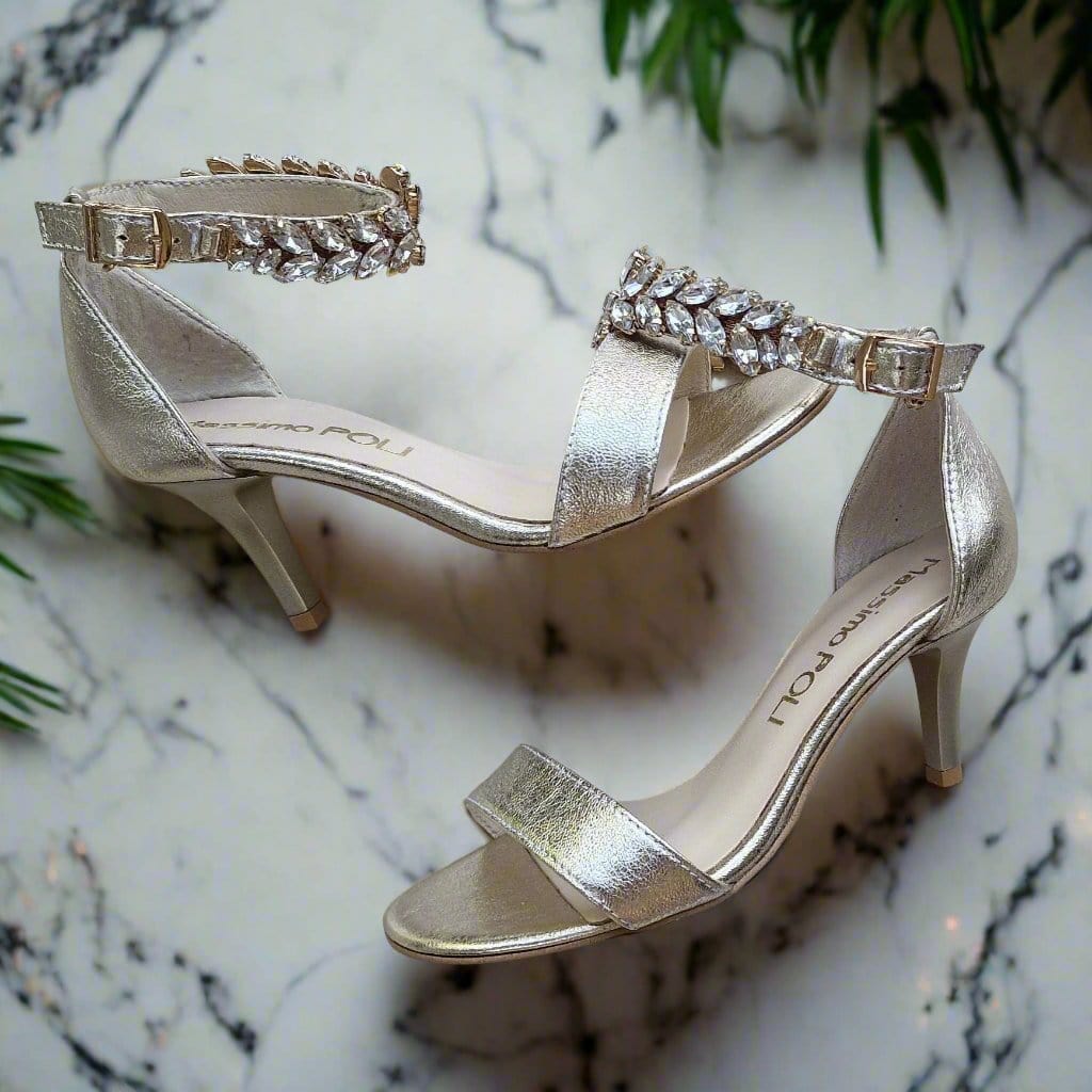 Gold leather petite ankle strap sandals with crystal brooch