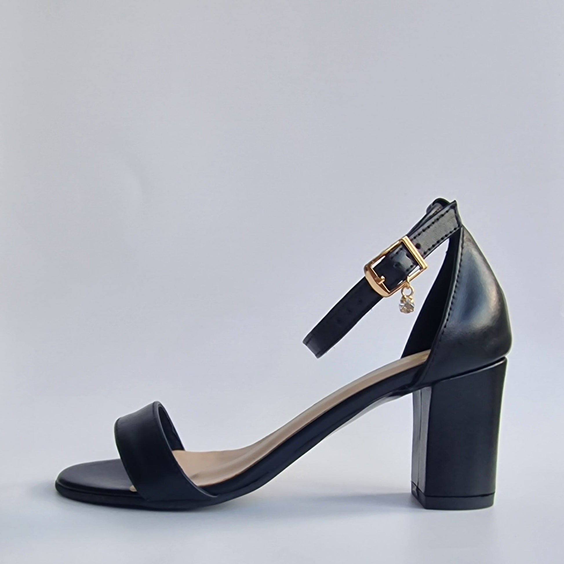 Barely there strap sandals with ankle buckle fastening 