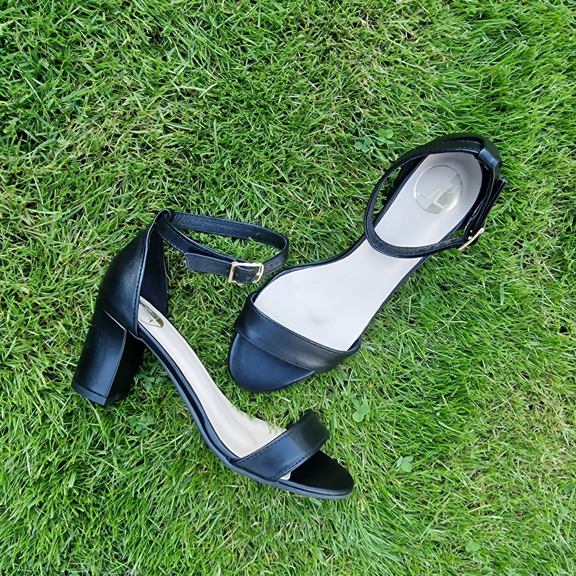 Ankle strap small size ladies heels in black leather