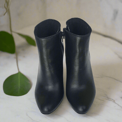 Black leather ankle boots with studs