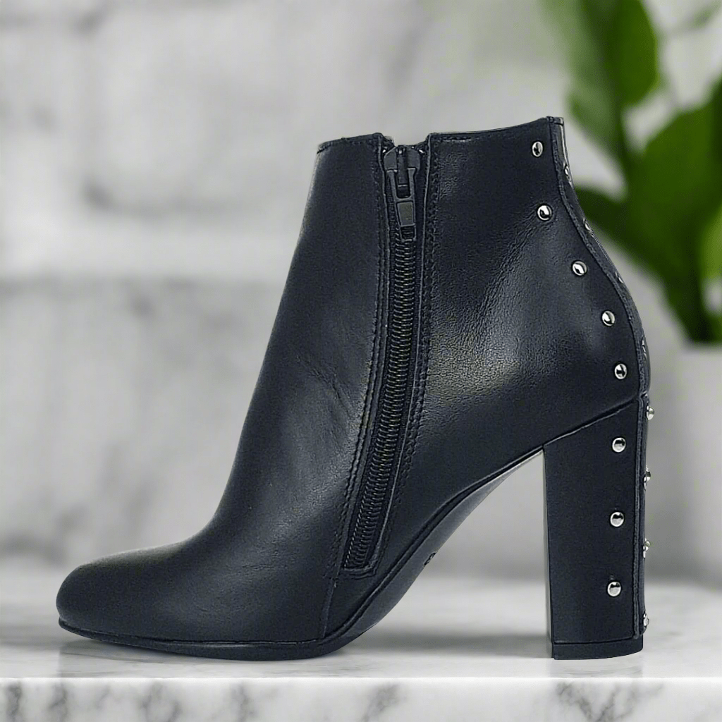 Black leather ankle boots with studs