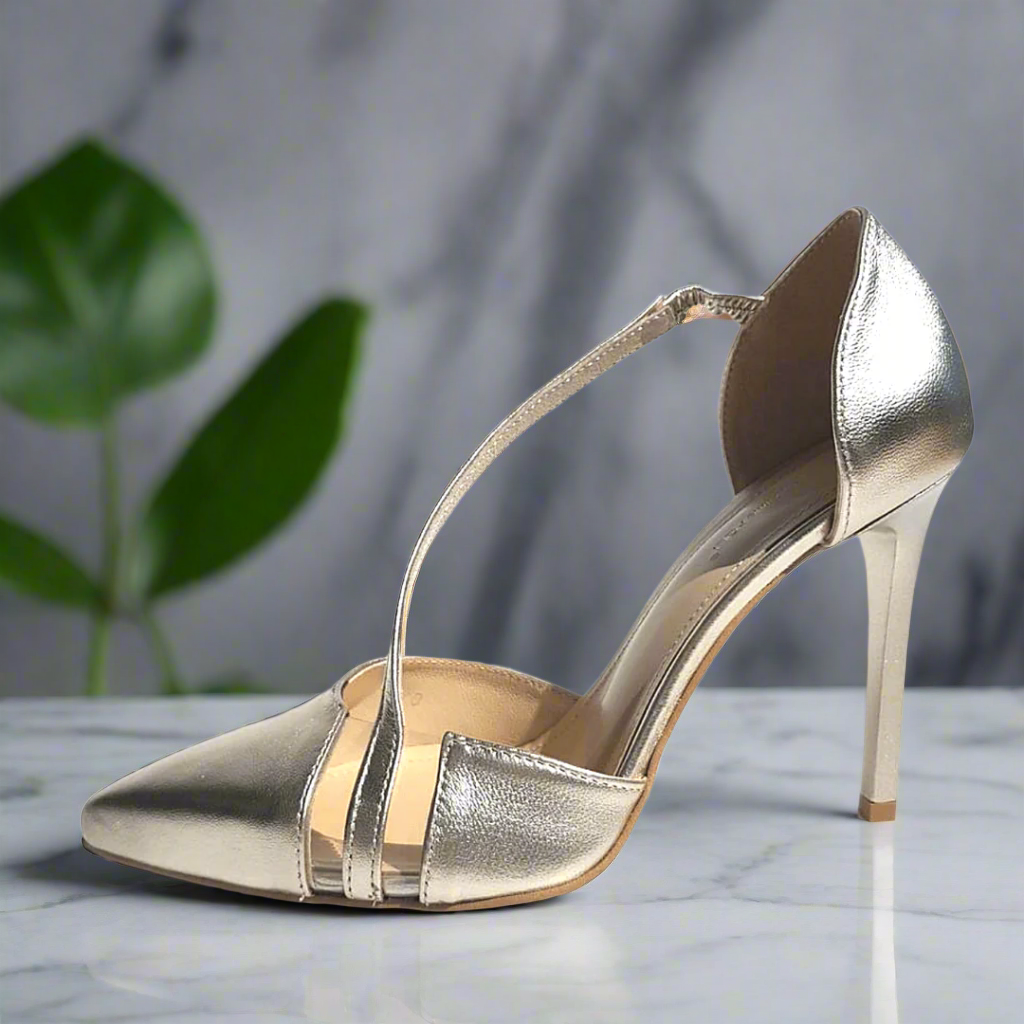 Pointed toe gold leather heels