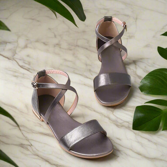 Petite gold leather sandals with a buckle