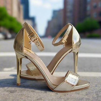 High heel stilettos set on a pavement