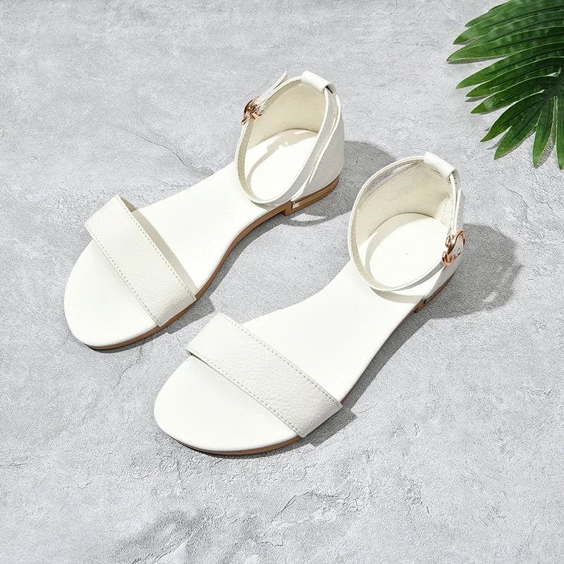 White leather petite leather sandals with a gold buckle 