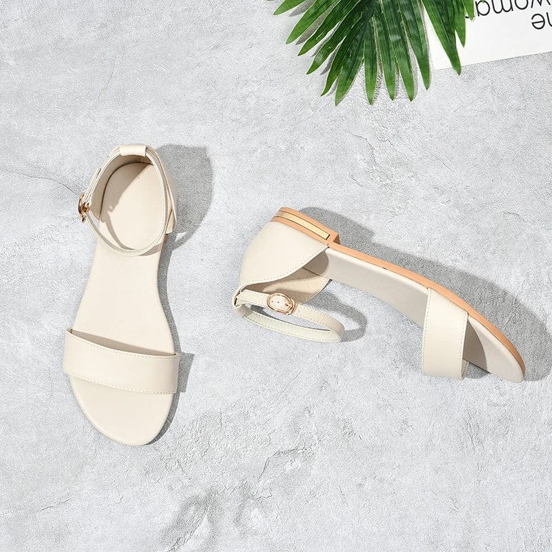 Beige leather and gold heel flat sandals 