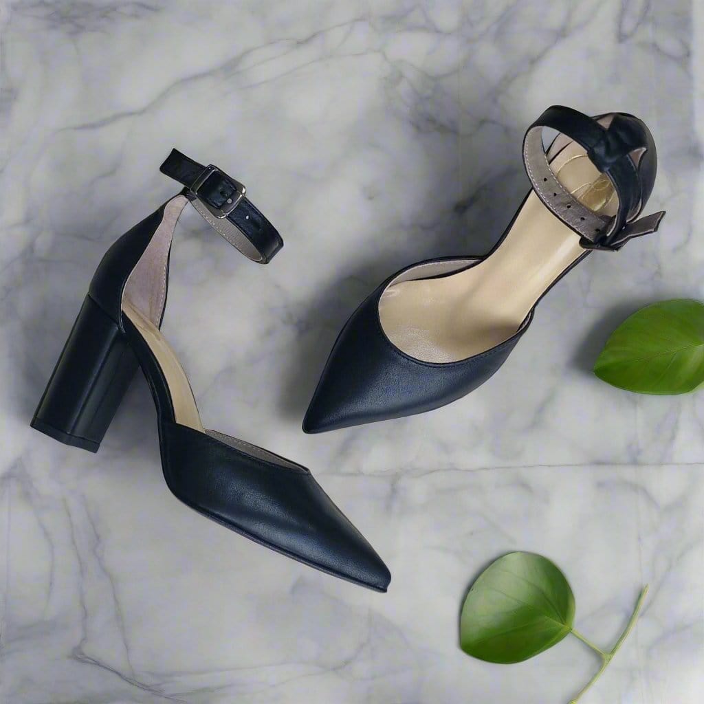 Petite black leather courts with an ankle strap