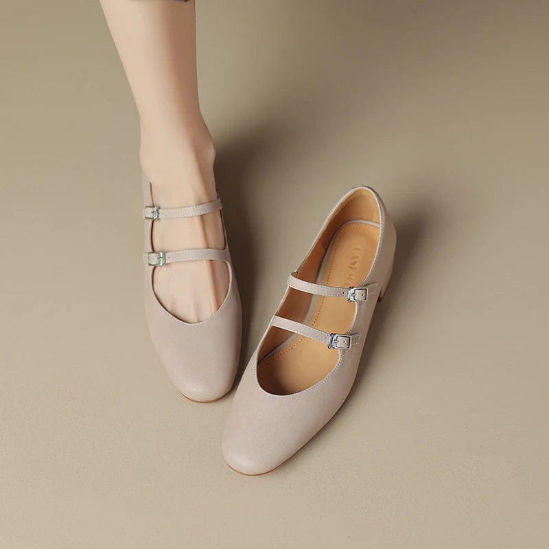 Petite beige leather Mary Jane style shoes on a kitten heel