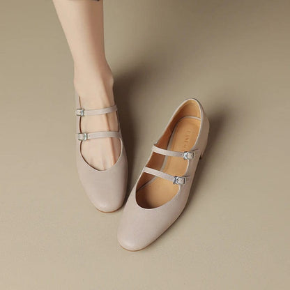 Petite beige leather Mary Jane style shoes on a kitten heel