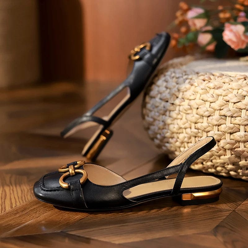 Black leather slingback sandals with gold buckle detail