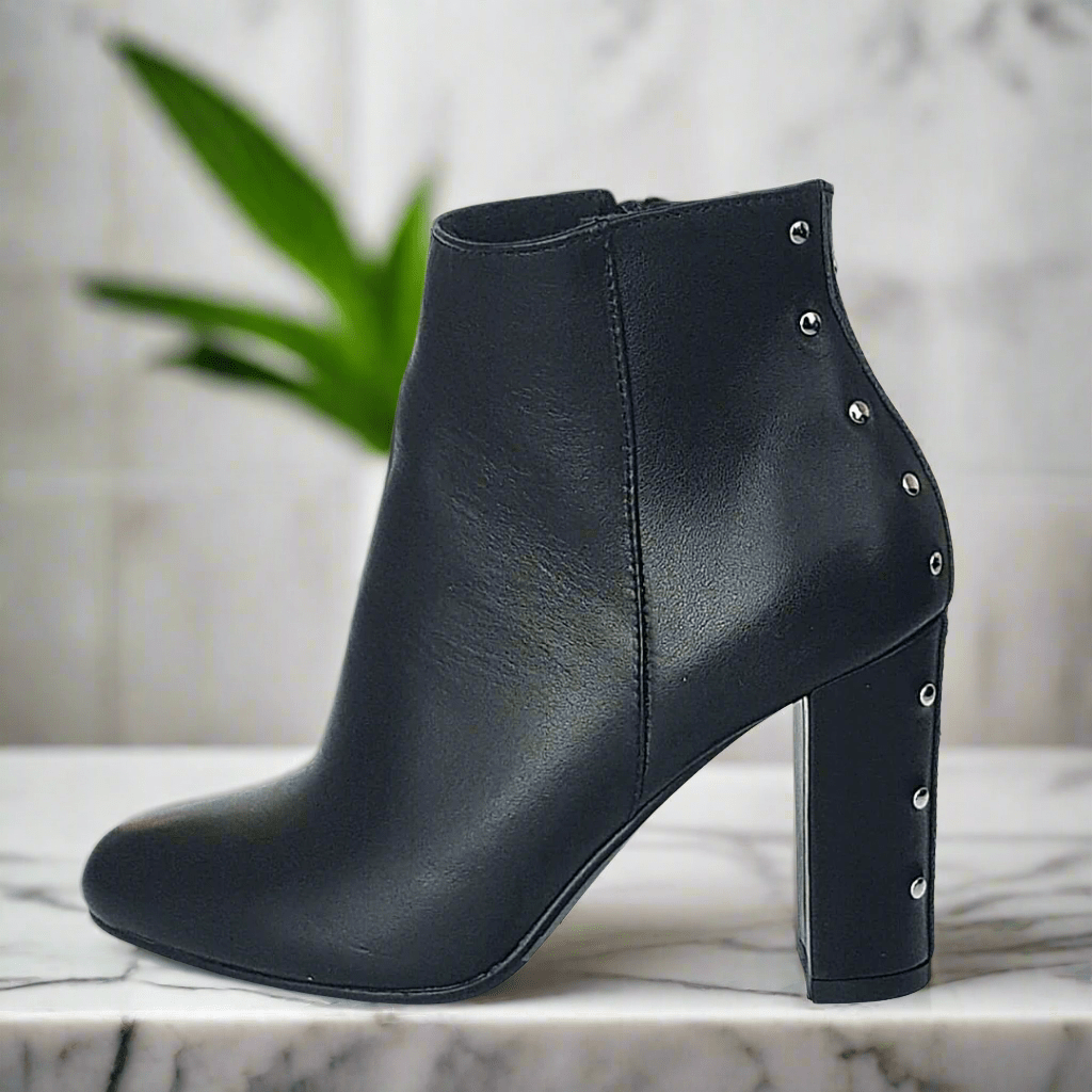 Black ankle boots with silver studs