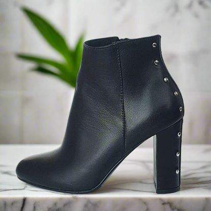 Black leather ankle boots with studs