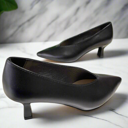 Pointed toe black leather court heels