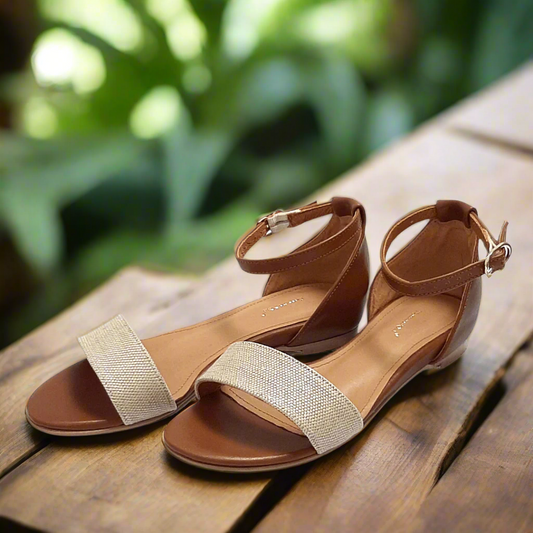 Ankle strap flat sandals in brown and gold leather